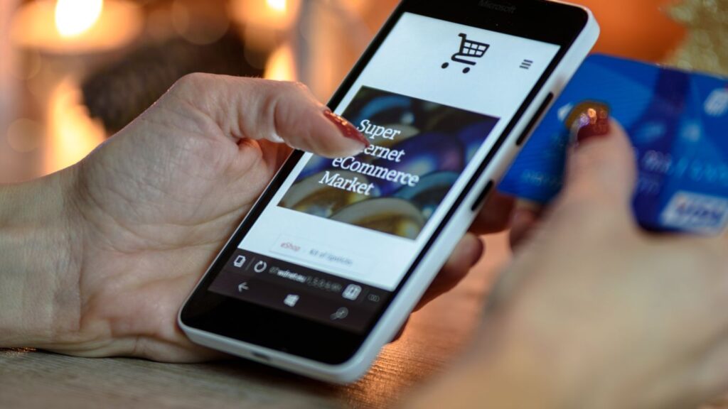A person holding a smart phone.